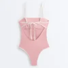 Bandeau-Badeanzug mit Kontrastbesatz Bandeau-Badeanzug mit Kontrastbesatz