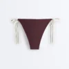 Bikinis-Slip mit Bindebändern und mittlerer Bedeckung Bikinis-Slip mit Bindebändern und mittlerer Bedeckung