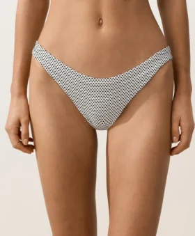 Bikinis-Slip mit mittlerer Bedeckung im U-Cut-Schnitt aus Jacquard mit Polka-Dot-Muster Bikinis-Slip mit mittlerer Bedeckung im U-Cut-Schnitt aus Jacquard mit Polka-Dot-Muster