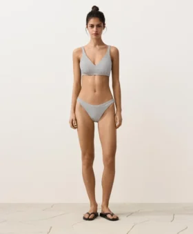 Bikinis-Slip mit mittlerer Bedeckung im U-Cut-Schnitt aus Jacquard mit Polka-Dot-Muster Bikinis-Slip mit mittlerer Bedeckung im U-Cut-Schnitt aus Jacquard mit Polka-Dot-Muster