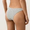 Bikinis-Slip mit mittlerer Bedeckung im U-Cut-Schnitt aus Jacquard mit Polka-Dot-Muster Bikinis-Slip mit mittlerer Bedeckung im U-Cut-Schnitt aus Jacquard mit Polka-Dot-Muster
