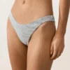 Bikinis-Slip mit mittlerer Bedeckung im U-Cut-Schnitt aus Jacquard mit Polka-Dot-Muster Bikinis-Slip mit mittlerer Bedeckung im U-Cut-Schnitt aus Jacquard mit Polka-Dot-Muster