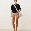 Bikinis-Slip mit mittlerer Bedeckung im U-Cut-Schnitt aus Jacquard mit Polka-Dot-Muster Bikinis-Slip mit mittlerer Bedeckung im U-Cut-Schnitt aus Jacquard mit Polka-Dot-Muster