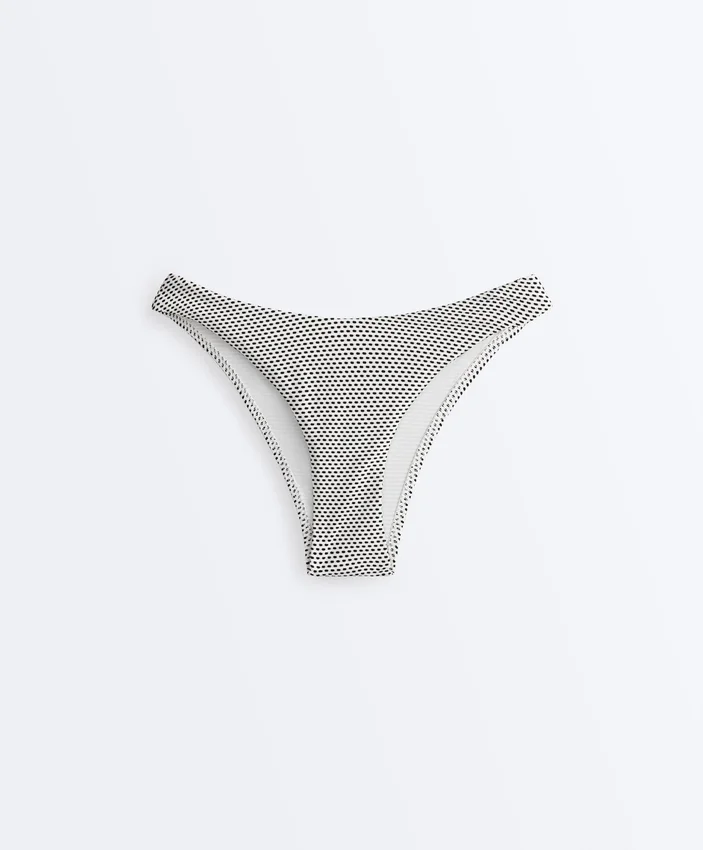 Bikinis-Slip mit mittlerer Bedeckung im U-Cut-Schnitt aus Jacquard mit Polka-Dot-Muster Bikinis-Slip mit mittlerer Bedeckung im U-Cut-Schnitt aus Jacquard mit Polka-Dot-Muster