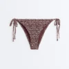Bikinis-Slip mit mittlerer Bedeckung und Smok-Bindebändern Bikinis-Slip mit mittlerer Bedeckung und Smok-Bindebändern