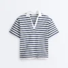 Boxy-T-Shirt aus Baumwollmischung mit kurzen Ärmeln und Rollkragen Boxy-T-Shirt aus Baumwollmischung mit kurzen Ärmeln und Rollkragen