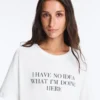 Boxy-T-Shirt aus Baumwollmischung mit kurzen Ärmeln und Slogan Boxy-T-Shirt aus Baumwollmischung mit kurzen Ärmeln und Slogan