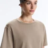 Boxy-T-Shirt aus Baumwollmischung mit kurzen Ärmeln und Slogan Boxy-T-Shirt aus Baumwollmischung mit kurzen Ärmeln und Slogan