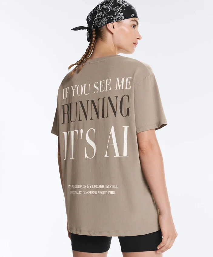 Boxy-T-Shirt aus Baumwollmischung mit kurzen Ärmeln und Slogan Boxy-T-Shirt aus Baumwollmischung mit kurzen Ärmeln und Slogan
