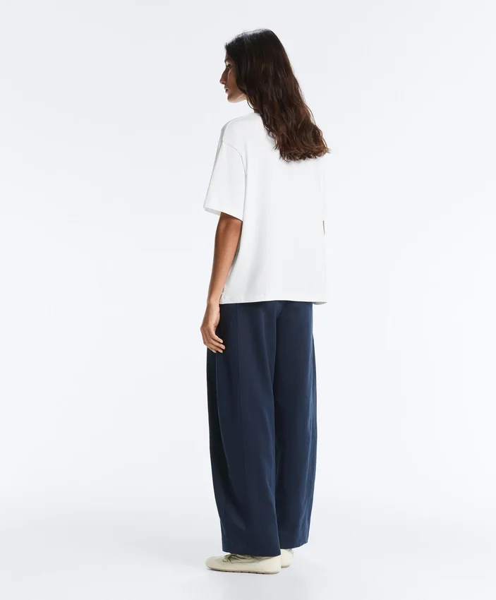 Boxy-T-Shirt aus Baumwollmischung mit kurzen Ärmeln und Slogan Boxy-T-Shirt aus Baumwollmischung mit kurzen Ärmeln und Slogan