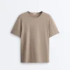 Boxy-T-Shirt aus Baumwollmischung mit kurzen Ärmeln und Slogan Boxy-T-Shirt aus Baumwollmischung mit kurzen Ärmeln und Slogan