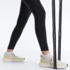 Compressive Leggings in Knöchellänge mit hoher Taille und Tasche Compressive Leggings in Knöchellänge mit hoher Taille und Tasche