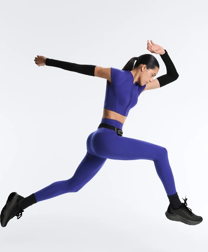 Compressive Leggings mit hoher Taille, reflektierenden Details und knöchellanger Passform Compressive Leggings mit hoher Taille, reflektierenden Details und knöchellanger Passform