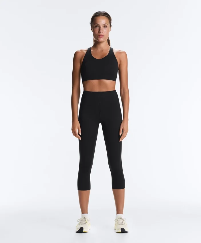 Compressive-Sport-BH mit gekreuztem Rücken und festem Halt Compressive-Sport-BH mit gekreuztem Rücken und festem Halt