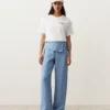 Gerade geschnittene Hose aus 100 % Leinen mit umgeschlagenem Bund Gerade geschnittene Hose aus 100 % Leinen mit umgeschlagenem Bund