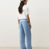 Gerade geschnittene Hose aus 100 % Leinen mit umgeschlagenem Bund Gerade geschnittene Hose aus 100 % Leinen mit umgeschlagenem Bund