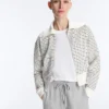 Gestreifte Jacke mit geripptem Kragen aus Baumwolle Gestreifte Jacke mit geripptem Kragen aus Baumwolle