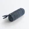 Gestreifte Tasche mit Knoten Gestreifte Tasche mit Knoten