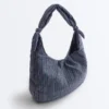 Gestreifte Tasche mit Knoten Gestreifte Tasche mit Knoten