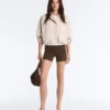 Gestreite Jacke mit ausgestellter Säume Gestreite Jacke mit ausgestellter Säume
