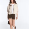 Gestreite Jacke mit ausgestellter Säume Gestreite Jacke mit ausgestellter Säume