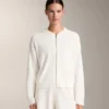 Gewaschene Strickjacke mit Kapuze Gewaschene Strickjacke mit Kapuze