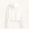 Gewaschene Strickjacke mit Kapuze Gewaschene Strickjacke mit Kapuze