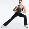 Hoch geschnittene Compressive-Hose mit ausgestelltem Bein Hoch geschnittene Compressive-Hose mit ausgestelltem Bein