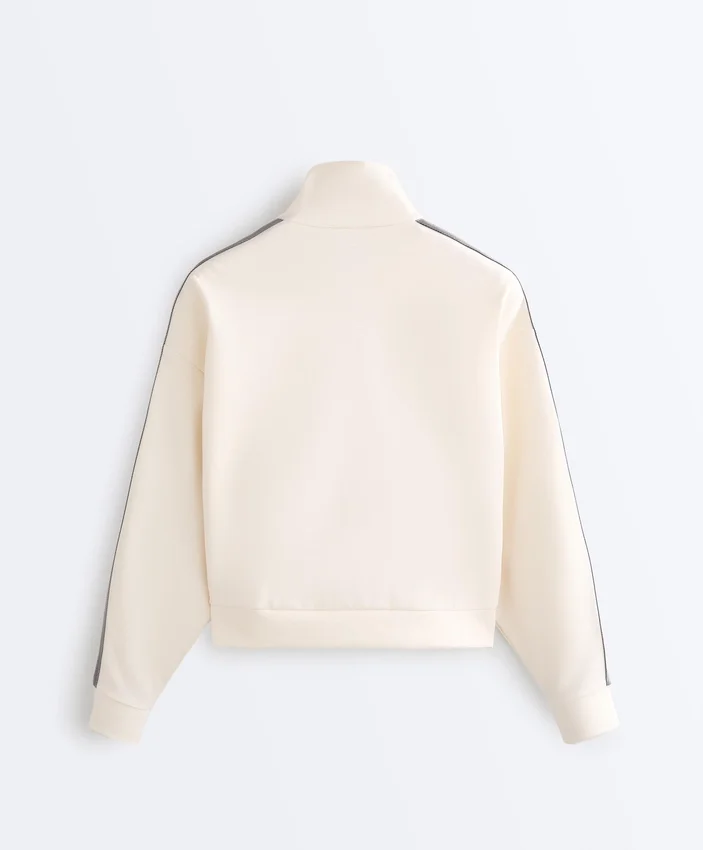 Jacke aus Piqué-Baumwolle mit Fischgrätenmuster an den Seiten Jacke aus Piqué-Baumwolle mit Fischgrätenmuster an den Seiten
