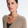 Jacke aus Rippstrick mit seitlichem Bindeband Jacke aus Rippstrick mit seitlichem Bindeband