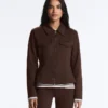 Jacke im Neopren-Look mit Schößchen und Rippbündchen