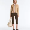 Jacke im Neopren-Look mit Schößchen und Rippbündchen Jacke im Neopren-Look mit Schößchen und Rippbündchen