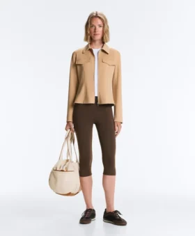 Jacke im Neopren-Look mit Schößchen und Rippbündchen
