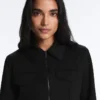 Jacke im Neopren-Look mit Schößchen und Rippbündchen Jacke im Neopren-Look mit Schößchen und Rippbündchen