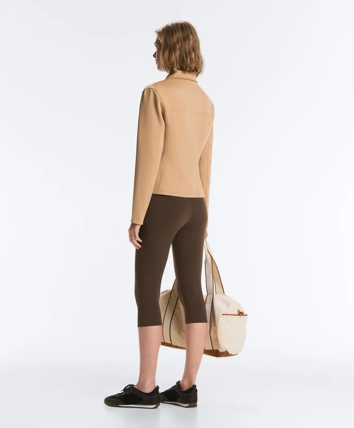 Jacke im Neopren-Look mit Schößchen und Rippbündchen Jacke im Neopren-Look mit Schößchen und Rippbündchen