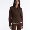 Jacke im Neopren-Look mit Schößchen und Rippbündchen