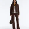 Jacke im Neopren-Look mit Schößchen und Rippbündchen
