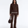Jacke im Neopren-Look mit Schößchen und Rippbündchen