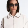 Jacke mit Paspeln im Neopren-Look Jacke mit Paspeln im Neopren-Look