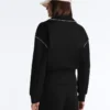 Jacke mit Paspeln im Neopren-Look