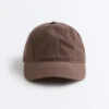 Kappe im Washed-Look aus 100 % Baumwolle mit Bindeband Kappe im Washed-Look aus 100 % Baumwolle mit Bindeband