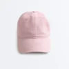 Kappe im Washed-Look aus 100 % Baumwolle mit Bindeband Kappe im Washed-Look aus 100 % Baumwolle mit Bindeband