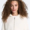 Kapuzenjacke aus gewelltem Strick Kapuzenjacke aus gewelltem Strick
