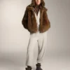 Kapuzenjacke mit weiten Ärmeln aus Baumwolle Kapuzenjacke mit weiten Ärmeln aus Baumwolle