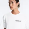 Kastenförmiges T-Shirt aus Baumwollmischung mit Slogan Kastenförmiges T-Shirt aus Baumwollmischung mit Slogan