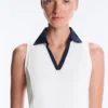 Kontrastfarbenes, ärmelloses Comfortlux-Poloshirt Kontrastfarbenes, ärmelloses Comfortlux-Poloshirt