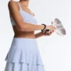 Kurzer Short mit hoher Taille und gestreiften Rüschen Kurzer Short mit hoher Taille und gestreiften Rüschen