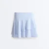 Kurzer Short mit hoher Taille und gestreiften Rüschen Kurzer Short mit hoher Taille und gestreiften Rüschen