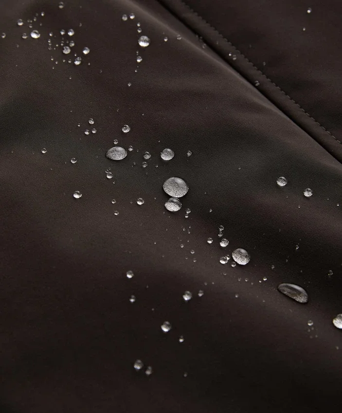 Lange, extra leichte, wasserdichte 10K-Jacke Lange, extra leichte, wasserdichte 10K-Jacke