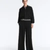 Lange Hose mit weitem Bein aus Soft Touch Modal und Falten Lange Hose mit weitem Bein aus Soft Touch Modal und Falten
